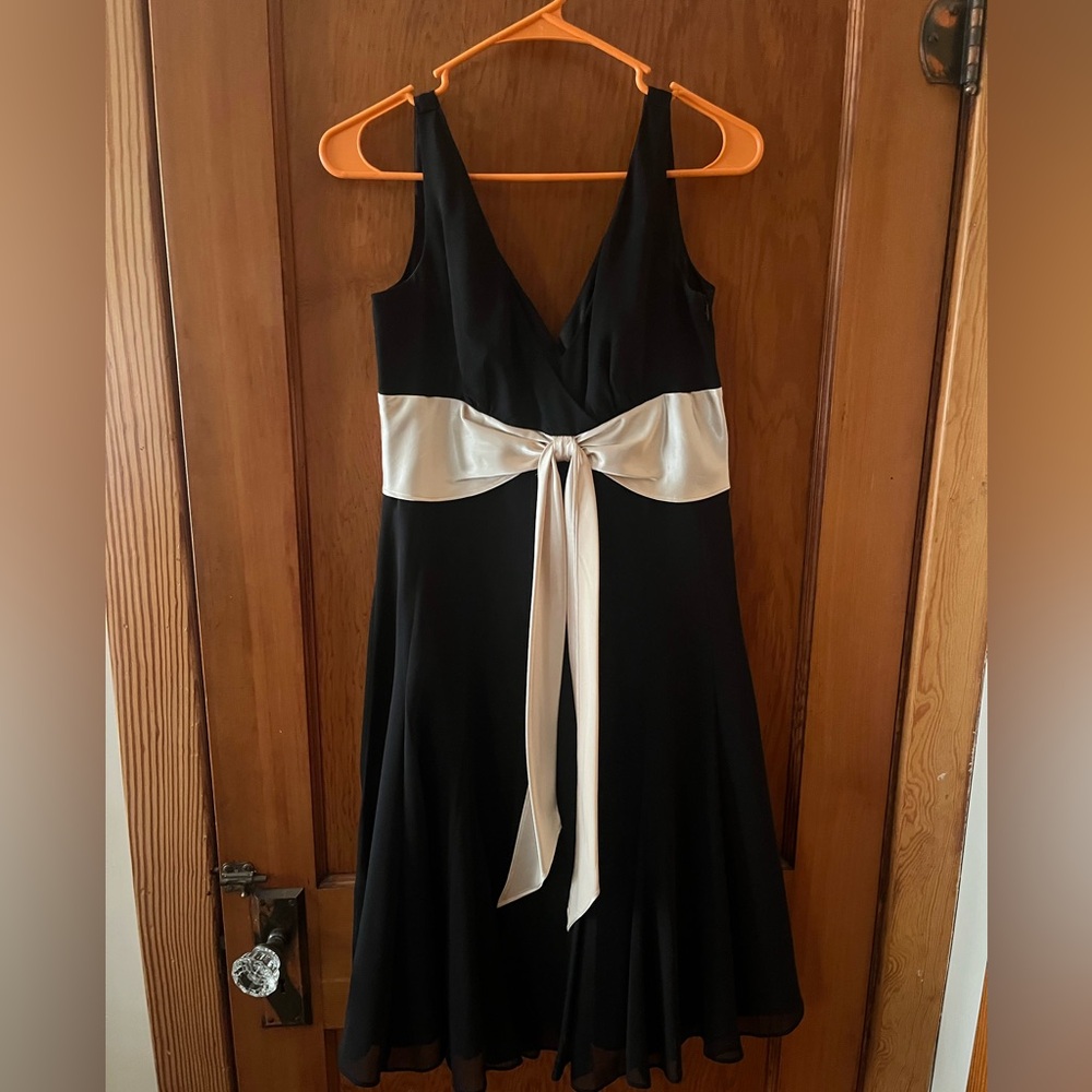 Black dress with gold bow